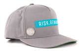 Risk.Reward® Golf Hat with Ball Marker - Barcode Teal